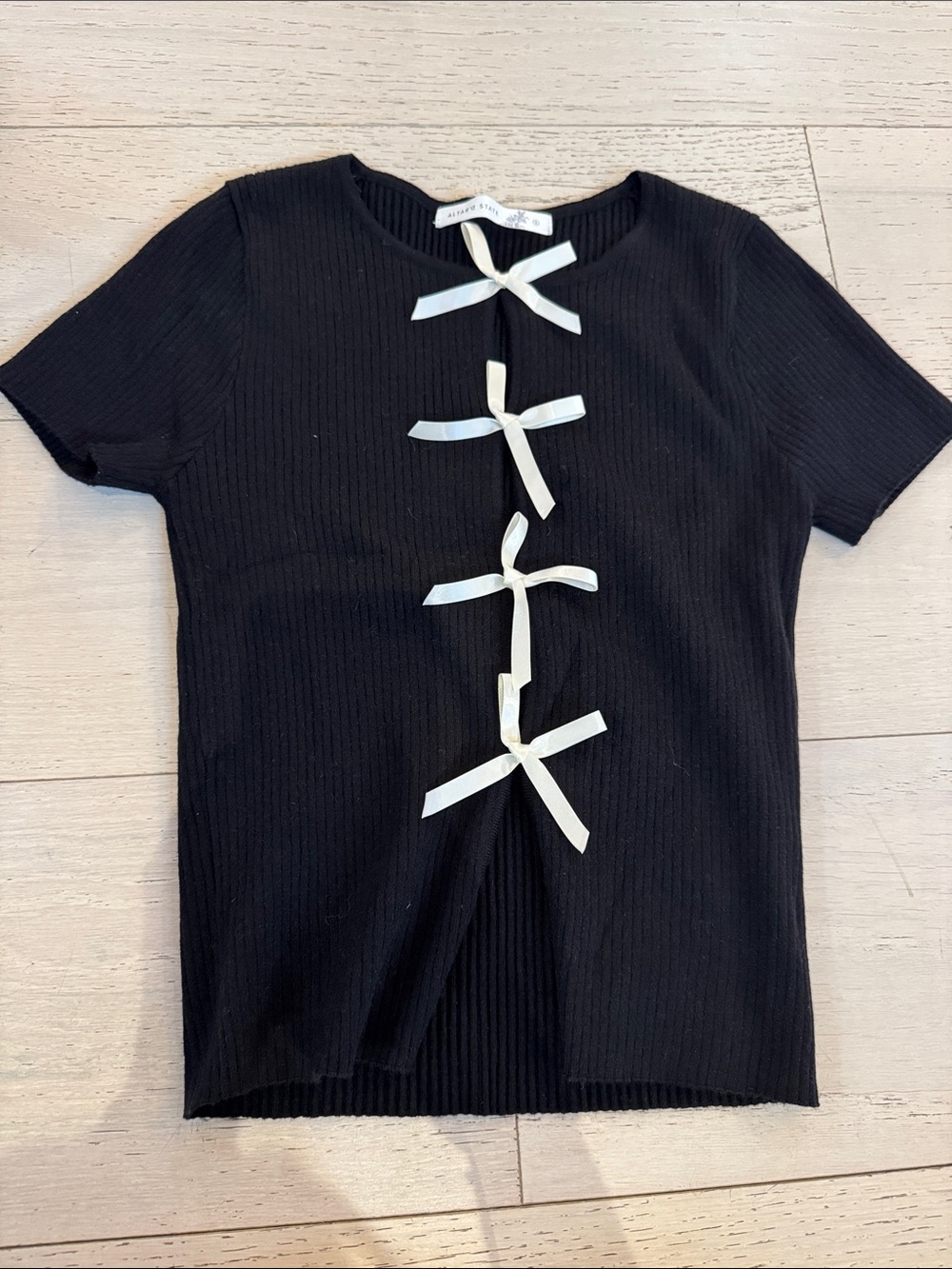 Altar'd State Black Ribbed Top with Ivory Bow Accents